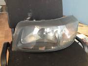 Продам фару левую черную, стекло притемненное оригинал на форд транзит